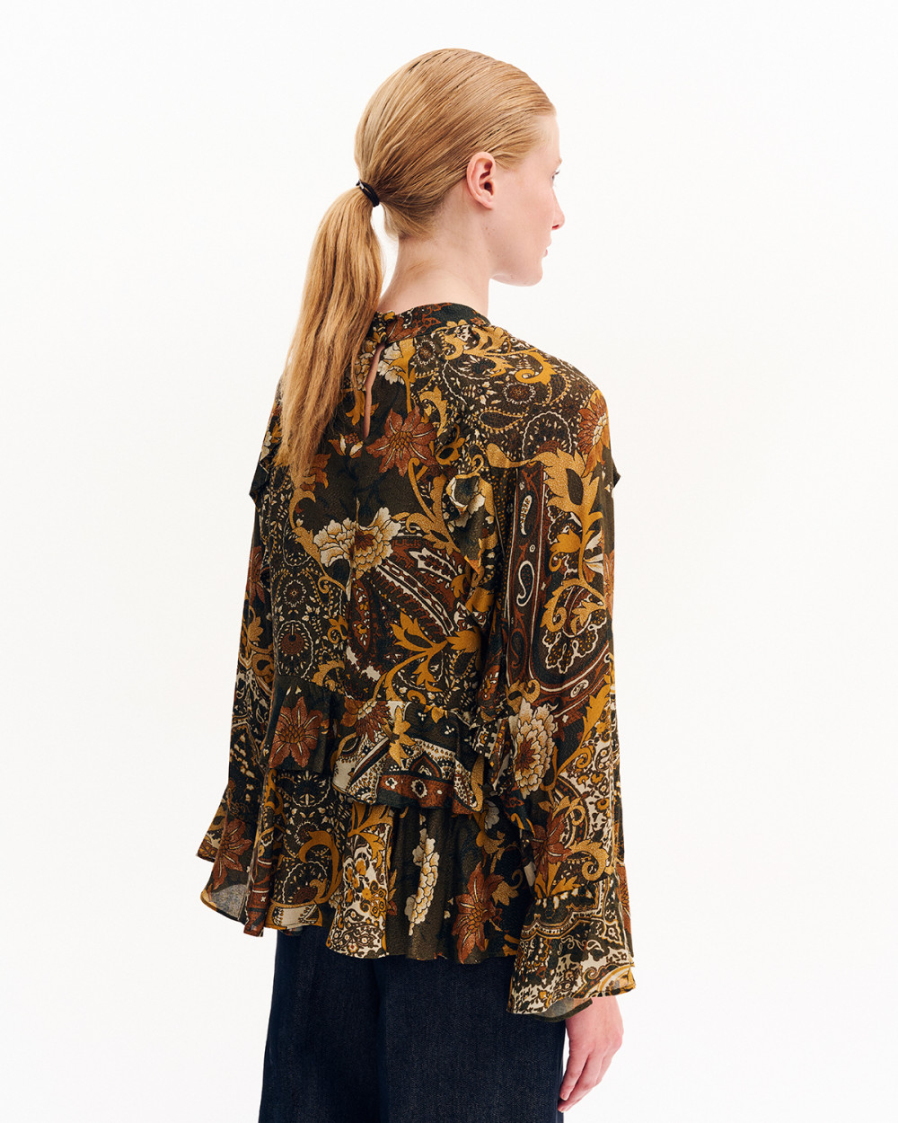 Μπλούζα εμπριμέ με βολάν Case Study