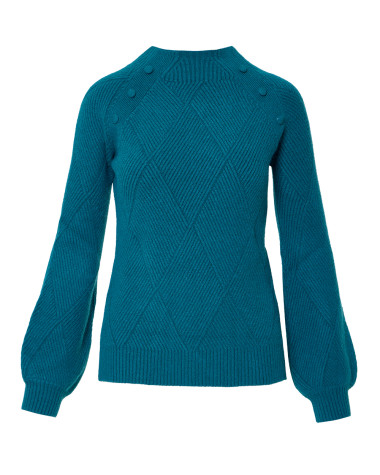 Πλεκτή μπλούζα με χαμηλό ζιβάγκο